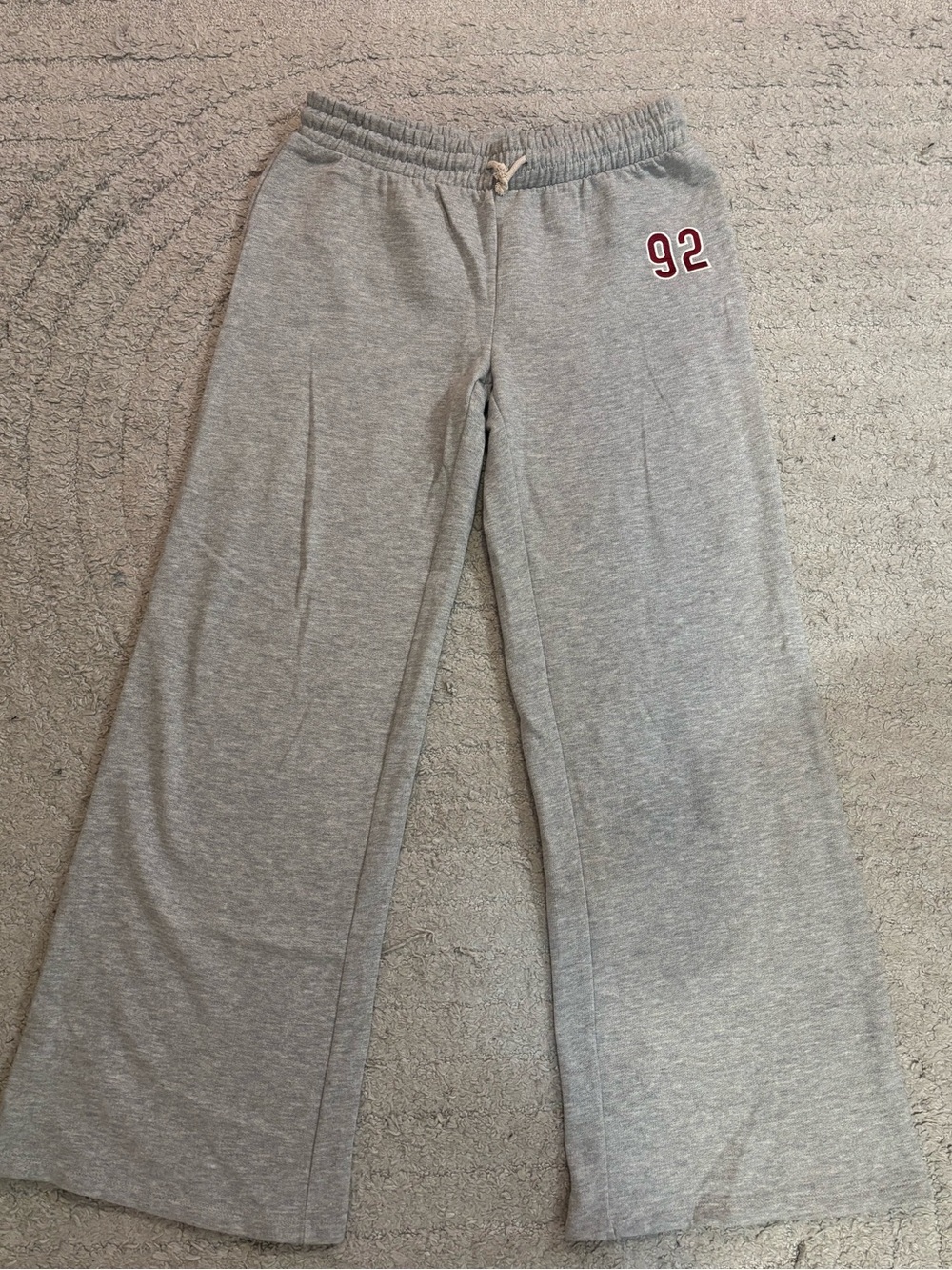 Primark Grey Joggers with Burgundy '92' Patch
